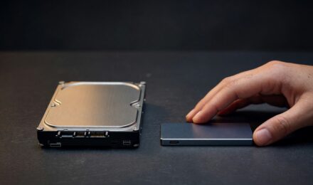 SSD vs HDD comparison showing a solid state drive and hard disk drive side by side