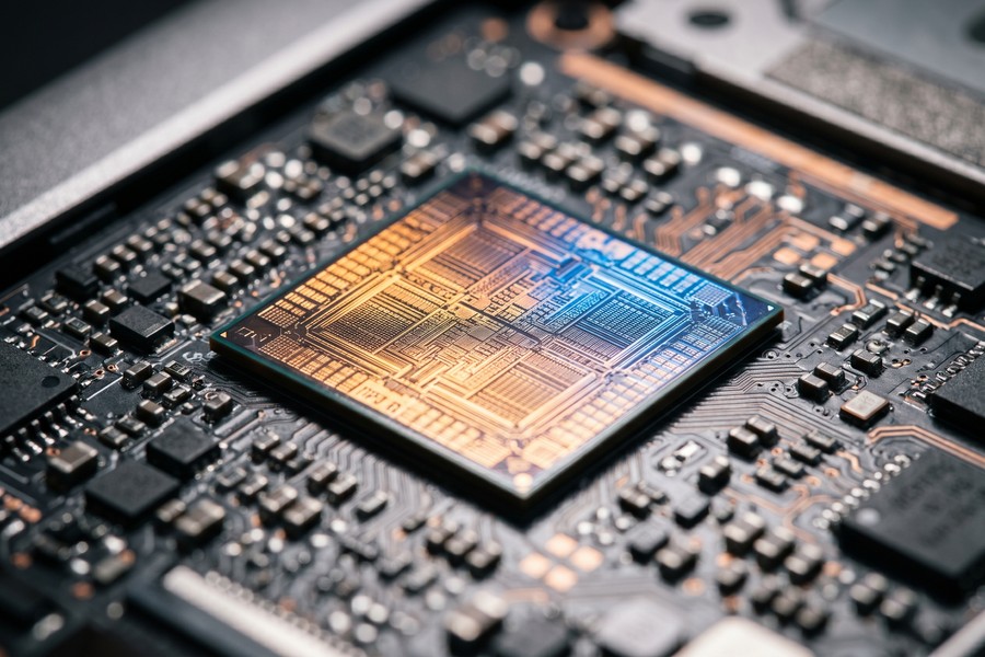 Cross-section illustration of a smartphone NPU chip running local AI inference