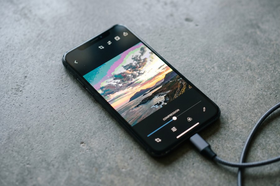 Mobile app interface showing automatic sky replacement controls on a smartphone screen