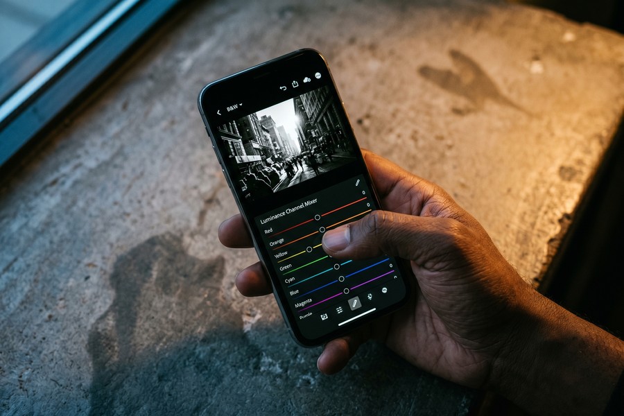 Luminance mixer panel in Lightroom Mobile showing 8 channel sliders for black and white conversion